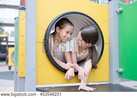 Sisterhood, Friendship. Two Charming Teen Girls Having Fun On A Modern Playground. Sister, Bffs Comm
