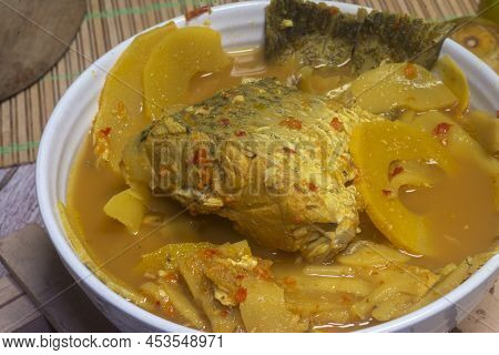 Southern Thai Gaeng Som - Sour White Snapper Fish Soup With Bamboo Shoots, Spicy Flavor.