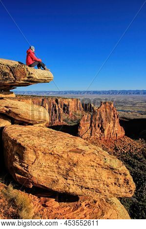 Hiker Injoying The View Of  Monument Canyon, Colorado National Monument, Grand Junction, Usa