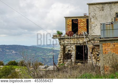 Abandoned House On A Mountains Background In Unpopulated Village In Cyprus