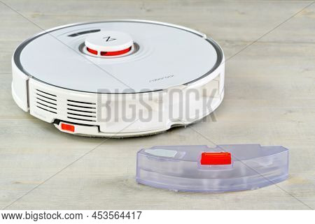 Tallinn, Estonia - March 03, 2022: Xiomi S7 Robot Vacuum Cleaner Water Tank Removed. Smart Cleaning 