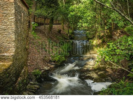 Surrounding Landscape Of The Estanislau Fountain Park And The Lourido River That Divides The Parishe