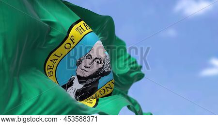 The Us State Flag Of Washington Waving In The Wind. Washington Is A State In The Pacific Northwest R