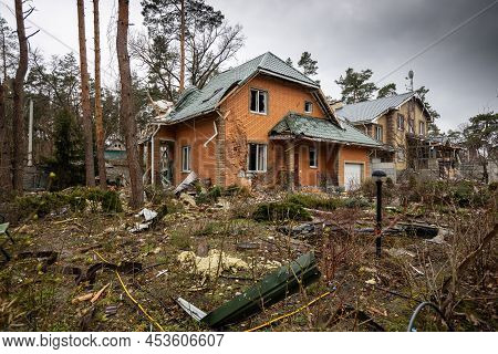 Irpin, Kyev Region Ukraine - 09.04.2022: Cities Of Ukraine After The Russian Occupation. House And Y