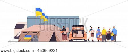 Volunteers Giving Help Boxes With Ukraininan Flag To Refugee Humanitarian Aid Material Assistance Go