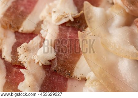 Raw Chopped Pork Lard With Meat, A Head Of Garlic And Rye Bread On A Wooden Background For Copy Spac
