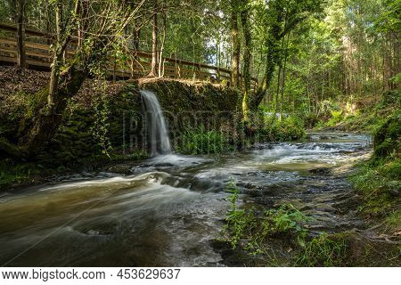 Surrounding Landscape Of The Estanislau Fountain Park And The Lourido River That Divides The Parishe