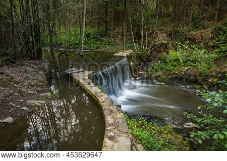 Surrounding Landscape Of The Estanislau Fountain Park And The Lourido River That Divides The Parishe