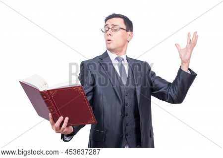 Man In Formal Wear Reciting In Studio