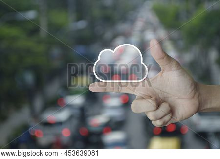 Cloud Computing Icon With Copy Space On Finger Over Blur Of Rush Hour With Cars And Road In City, Te