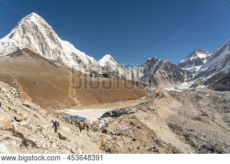 A Panoramic View Of Gorak Shep, Kala Patthar And The Khumbu Valley With The Snow Covered Himalaya Mo