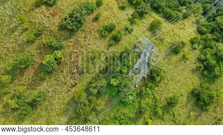 Transmission Tower, Power Tower Or Electricity Pylon. Steel Structure Framing To Support Or Carry Ca