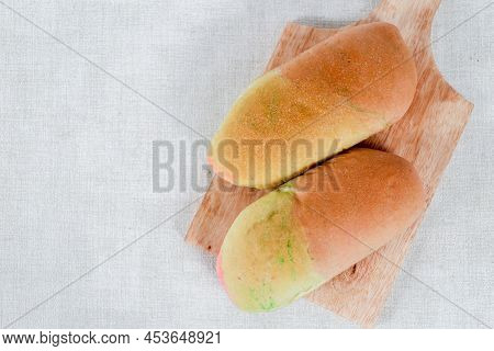 Rainbow Long John Buns Bread With Copy Space For Text