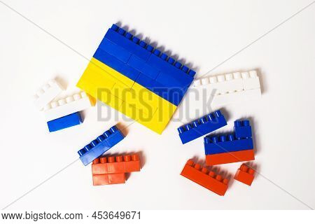 War Between Ukraine And Russia. Concept In The Form Of A Constructor With The Colors Of National Fla
