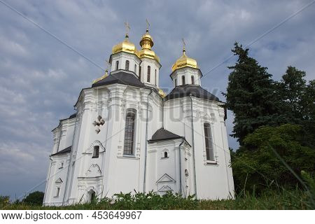 Beautiful Cloudy Sky Over The Ancient Orthodox Church Of St. Catherine In The Ukrainian City Of Cher