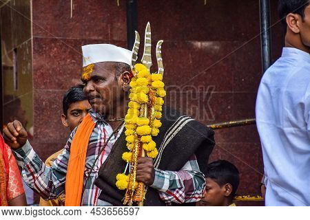 Yadgir,india- December 22nd 2019; Stock Photo Of Indian Priest, Wearing Casual Cloths, Saffron Color
