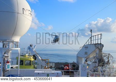 Andaman Sea / Myanmar 05.11.2012: Heli Union's Sikorsky S-76 C++ Helicopter Landing On Seismic Surve