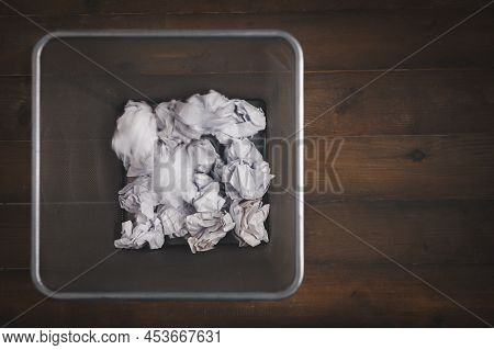Motion Of Crumpled In Rubbish Bin. Waste Paper In Office Garbage Bin. Junk, Wastepaper In Rubbish On