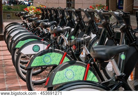 Toronto, Canada - 08 03 2018: Bike Share Toronto Bikes With Green Logo Lined Up In A Bike Rentals St