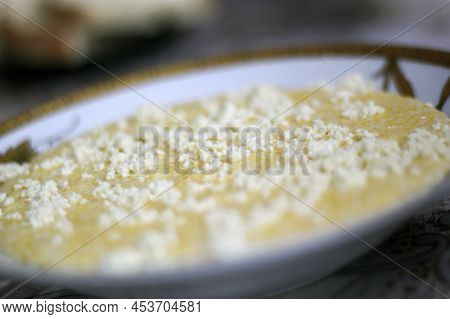 Banush Or Banosh. Traditional Ukrainian Dish Prepared From Cornmeal With Added Smetana, Pork Rind, M