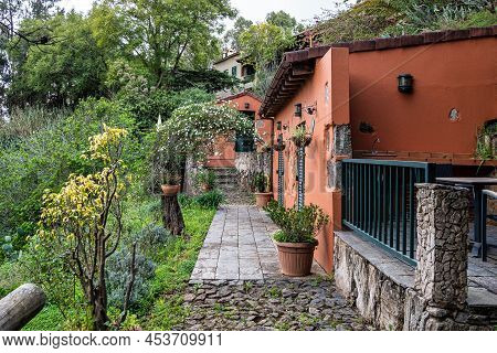 Country House Surrounded By Vegetation At El Lance In Gran Canaria. Canary Islands, Spain.