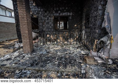 Hostomel, Kyev Region Ukraine - 09.04.2022: Cities Of Ukraine After The Russian Occupation. Houses T