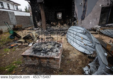 Hostomel, Kyev Region Ukraine - 09.04.2022: Cities Of Ukraine After The Russian Occupation. Houses T