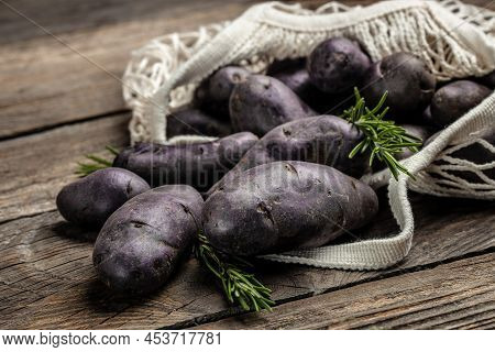 Organic Purple Sweet Potato. Raw Sweet Potatoes Or Batatas. Pomoea Batatas. Batata Potato. Vegan Foo