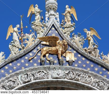 Venice, Ve, Italy - July 13, 2020: Winged Lion Of Saint Mark In Gold Symbol Of Italian Island Of Ven
