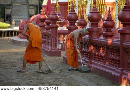 Chiang May, Thailand - December 22, 2018: Young Monks Clean Up The Grounds Of Wat Phantao Buddhist T