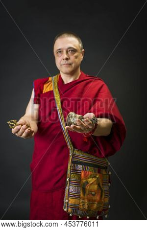Tibet Monk Whith Ritual Atributs Prayer Beads And Ball Dharma