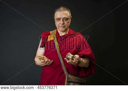 Tibet Monk Whith Ritual Atributs Prayer Beads And Ball Dharma