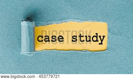 The Phrase Case Study Appears On Yellow Background Under Torn Blue Paper.