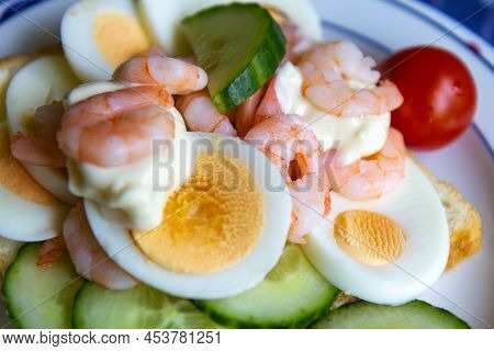 Scandinavian Sandwich With Shrimps Egg Tomato And Sliced Cucumber
