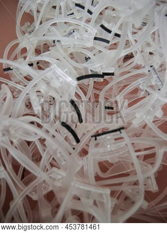 Semi-processed Plastic Propionate Sunglasses Lying In A Box Awaiting The Following Processing.