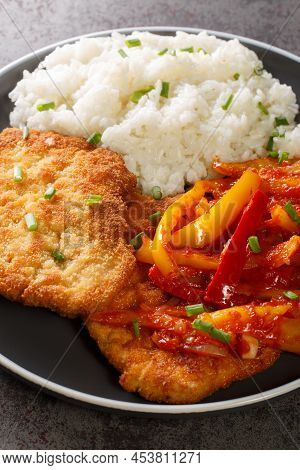 Zigeuner Schnitzel Or Balkanschnitzel Or Paprikaschnitzel Gravy With Peppers And Onions Close-up In 