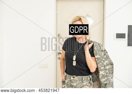 Gdpr - General Data Protection Regulations Military Concept. Soldier Offers A Padlock With Gdpr Word