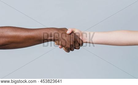 Woman And African Woman Hand. Helping Hand, Rescue, Multiathnic People. Helping Hands, Rescue Gestur