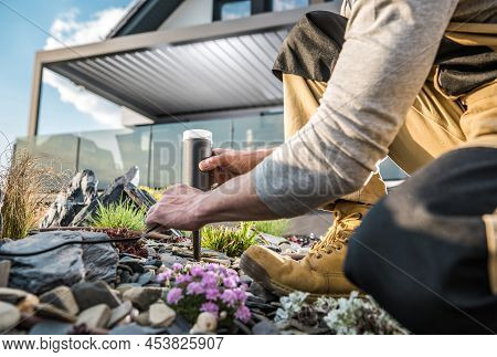 Modern Rockery Garden Led 12 Volt Lighting System Installation Performed By Professional Landscaper.