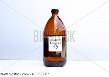 Potassium Hydroxide In Bottle, Chemical In The Laboratory And Industry