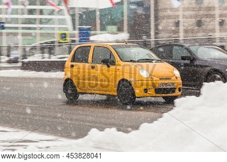 Car Daewoo Matiz First Generation M150 Driving At Winter City Streets During Snowfall. Moscow, Russi