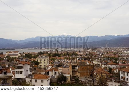 Beautiful View At Roofs Of Houses Incity Of Fethie, Turkey, On Background Of Mountains. Beauty In Na