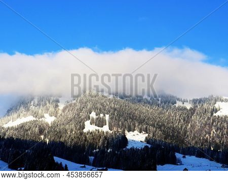 Icy Winter Atmosphere And Low Clouds On A Snowy Peak Stockberg (1781 M) In The Alpstein Mountain Ran