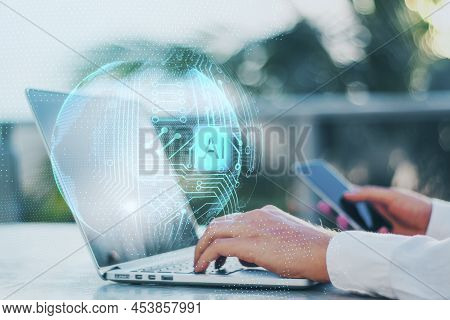 Close Up Of Businessman Hands Using Laptop And Smartphone With Abstract Glowing Ai Sphere On Blurry 