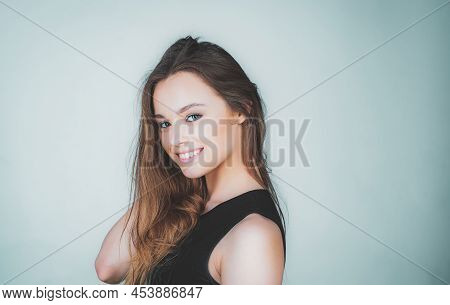 Young Beautiful Cute Cheerful Girl Smiling Looking At Camera Over White Background. Portrait Of Happ