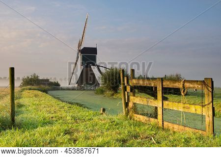 Gate In Front Of The Wingerdse Molen