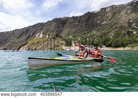 Quilotoa, Ecuador - April 16, 2022: Lake Quilotoa In Caldera Of Eponymous Volcano. A Couple Of Touri