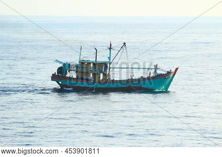 Andaman Sea, Myanmar - 03.20.2019: Myanmarese / Burmese Fishing Boat Trawling In The Andaman Sea