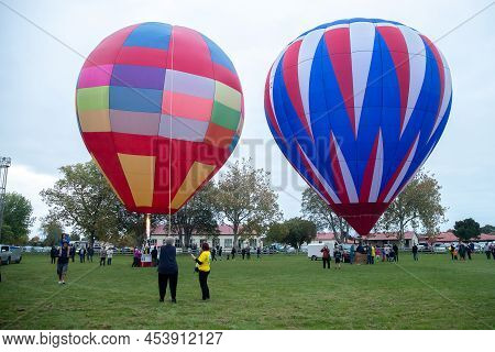 Masternon, New Zealand April, 22 2022 - People Attending Hot Air Balloon Festival In Masterton New Z