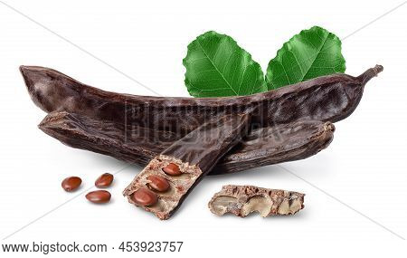 Ripe Carob Pods And Bean Isolated On White Background With Clipping Path And Full Depth Of Field